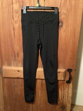 Girls black Titan pants, %spandex, small